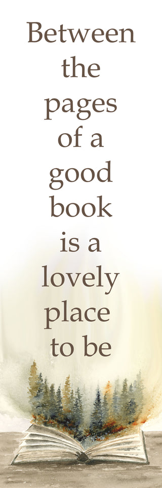 Open book with a forest illustration and text 'Between the pages of a good book is a lovely place to be' on a white background.